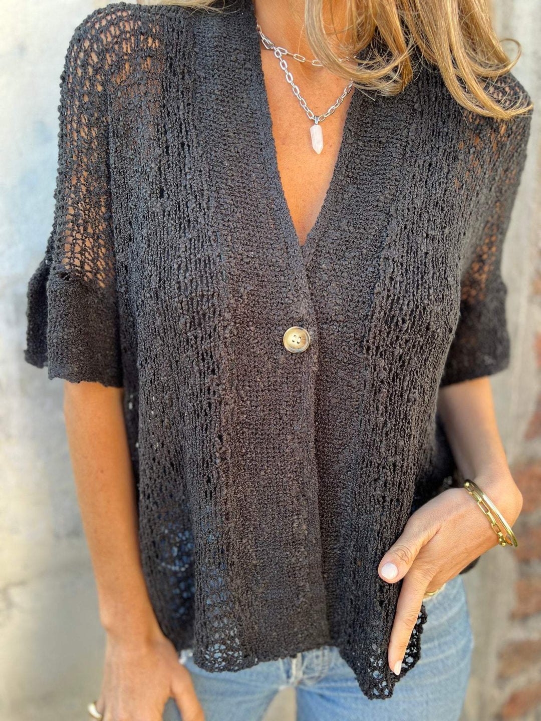CYRA – TEXTURED V-NECK TOP